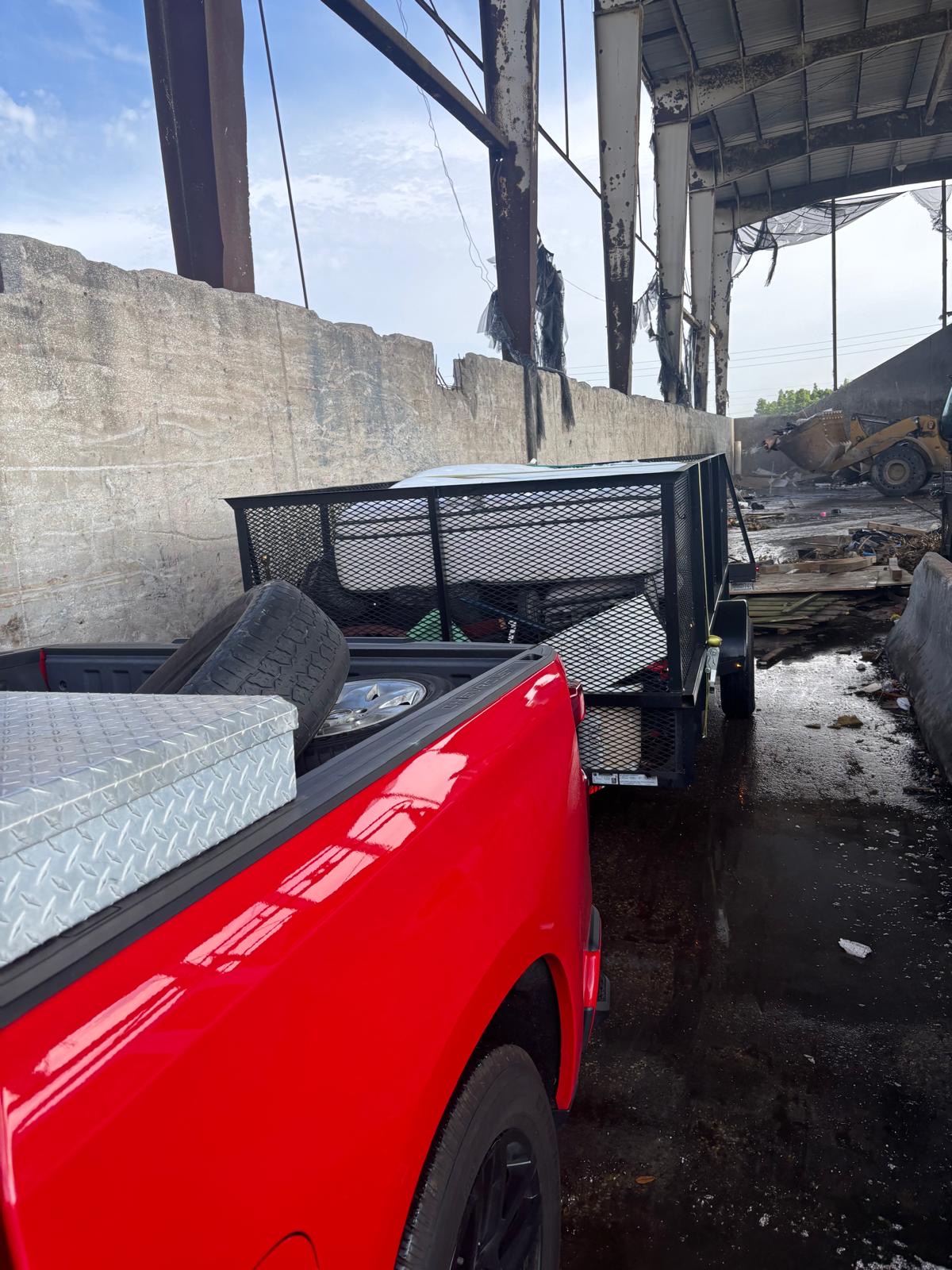 Hauling junk to the landfill with truck and trailer